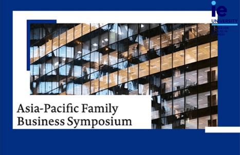 A promotional image for the Asia-Pacific Family Business Symposium hosted by IE University, featuring a modern building facade.