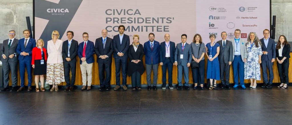 A group of individuals standing together for a photo at the CIVICA Presidents' Committee event.