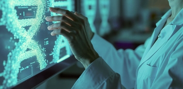 A scientist interacting with a digital display of DNA strands.