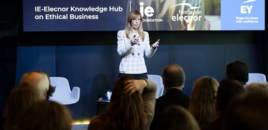 A speaker presents at an event focused on ethical business.