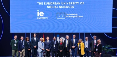 A group of professionals gathered at an event hosted by the European University of Social Sciences.