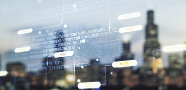 A blurred cityscape with digital coding elements overlaying the image.