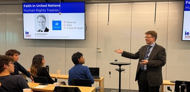 A speaker presenting at a seminar on human rights treaties at the United Nations.