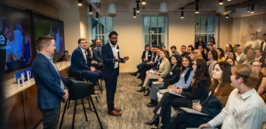 A diverse group of professionals engaging in a business presentation.