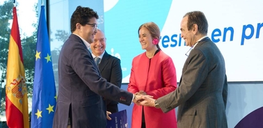 A formal event showcasing the presentation of an award or recognition.