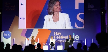 An event featuring speakers on stage at the Hay Festival in Segovia.