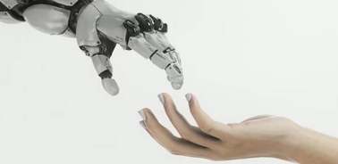 A robotic hand reaching out to touch a human hand.