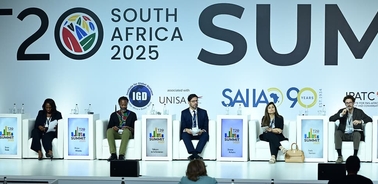 A panel discussion at the T20 Summit in South Africa, featuring multiple speakers.