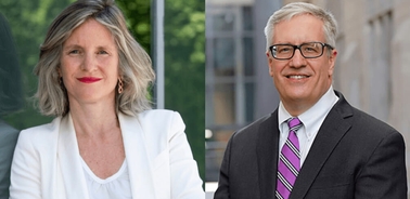 A side-by-side image of a woman in a white blazer and a man in a grey suit with a purple tie, both smiling and standing against blurred architectural backgrounds.