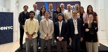 A group of professionals posing together at an event.
