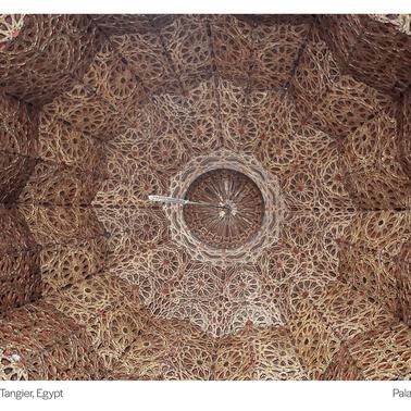 The intricate ceiling of the Kasbah Palace in Tangier, Egypt, showcases beautiful architectural details.