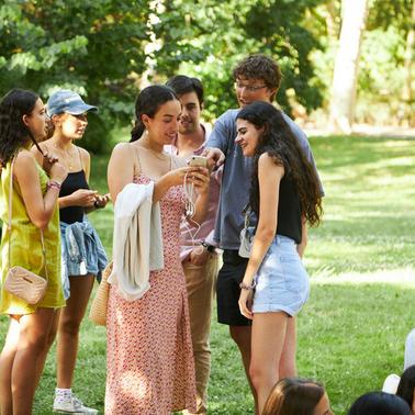 A group of friends enjoying a sunny day in the park.