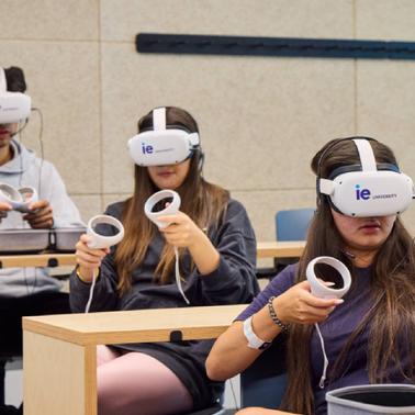 Students engaging in a virtual reality experience in a classroom.