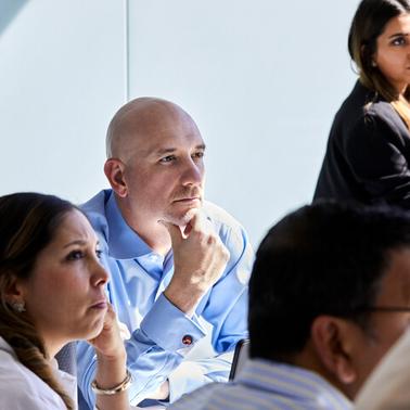 Global Executive MBA student paying attention during a class