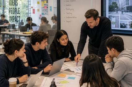 A group of students collaborating in a modern workspace on a project about sustainable mobility.