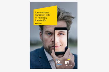 A man holds up a smartphone displaying part of a face, merging with his, against a conceptual publication cover.