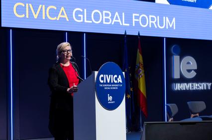 A speaker presents at the CIVICA Global Forum event.