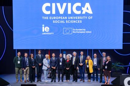 A group of people posing together at a CIVICA event.