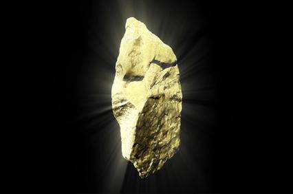 A luminous gold-colored rock with a jagged shape.