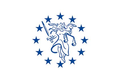 The image features a representation of Justice, symbolized by a figure holding scales and a sword, surrounded by stars.