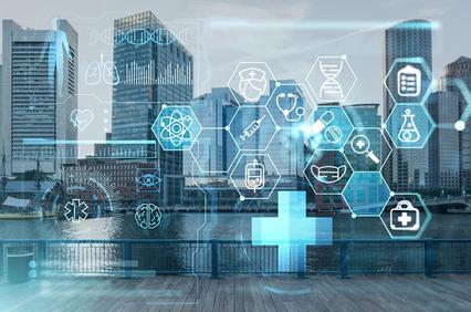 A cityscape with digital health icons overlaying the skyline.