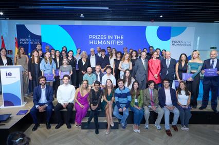 A large group of people posing for a photo at an event celebrating humanities prizes.
