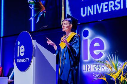 A graduate speaking at a university ceremony.