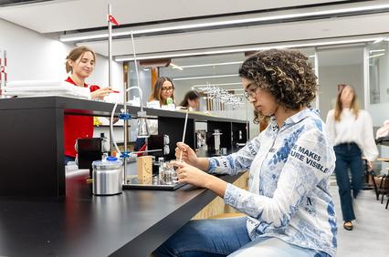 A group of students is engaged in a science laboratory activity.