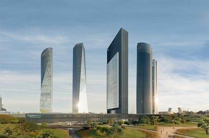 A modern skyline featuring tall skyscrapers against a clear sky.