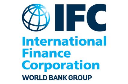 Logo of the International Finance Corporation, featuring a stylized globe with the text 'IFC International Finance Corporation World Bank Group'.