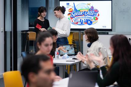 A group of people participating in a language exchange event called Speak-Date.