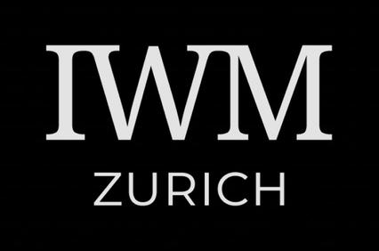 The image displays a logo with the letters 'IWM' and the word 'ZURICH' against a black background.