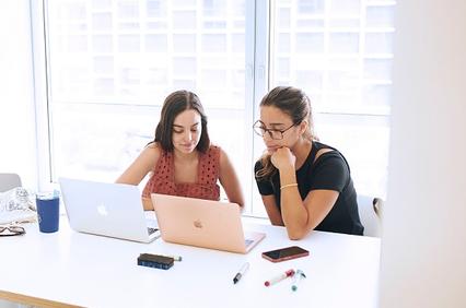 IE students with a computer