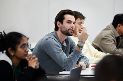 A group of students engaged in a classroom discussion.