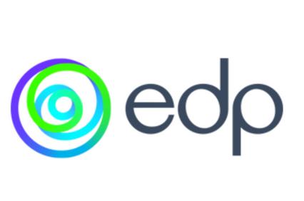 A modern logo featuring a spiral design in vibrant colors.