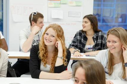 Group of students engaging in a classroom discussion.