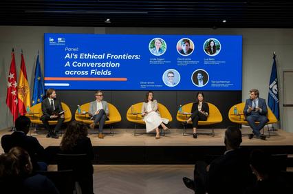 A panel discussion on AI's ethical frontiers featuring multiple speakers.