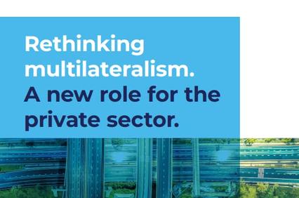 An aerial view illustrating complex road networks with a message about rethinking multilateralism.