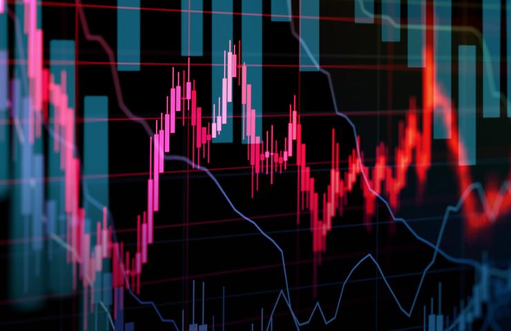 This image displays a dynamic view of stock market charts with various types of graphs indicating financial data trends.