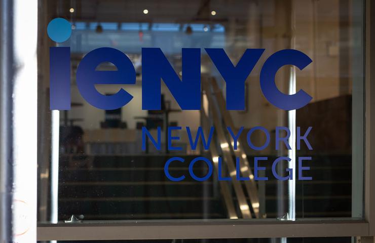 The entrance window of a college featuring the name 'ieNYC New York College'.