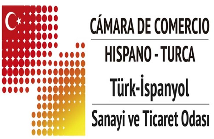 Logo of the Hispanic-Turkish Chamber of Commerce featuring a red and orange dot gradient, along with text in Spanish and Turkish.