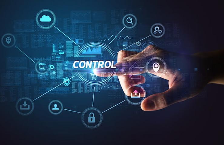 A hand interacts with a futuristic interface displaying the word CONTROL surrounded by various digital icons and symbols.