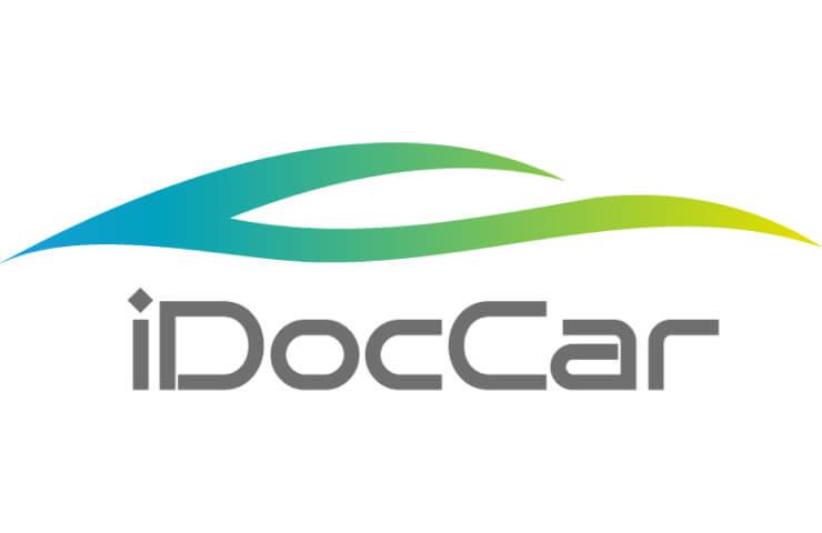 Logo of iDocCar featuring a stylized wave design in green, blue, and yellow colors.
