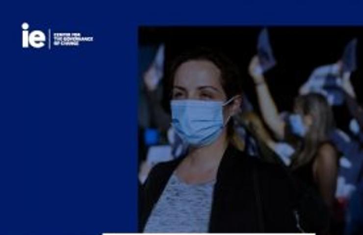 A cover of a policy report titled 'The New Digital Domain' showing a woman wearing a mask at a protest.