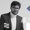 IE black and white image with a men with glasses