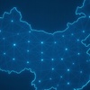 A glowing digital representation of the map of China.