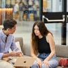Two IE students speaking