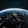 A global network of connections depicted from a satellite view of Earth at night.