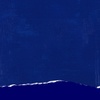 A textured blue background with a white torn edge at the bottom.