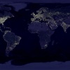 A satellite image showing the night lights of Earth's continents from space.